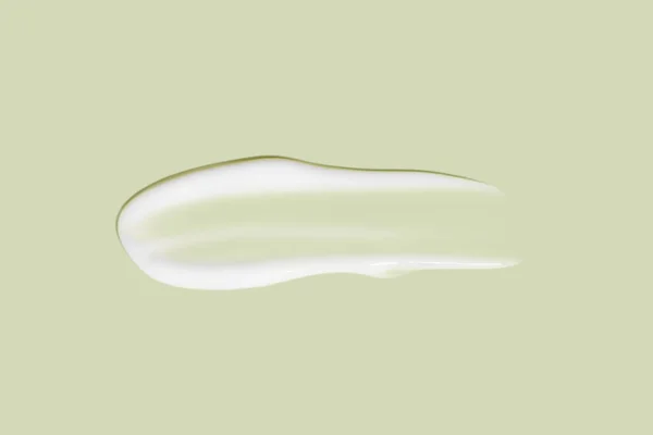 Flowing Cream Green Background Smudged Flowing Smear Cosmetic Cream — Stock Photo, Image