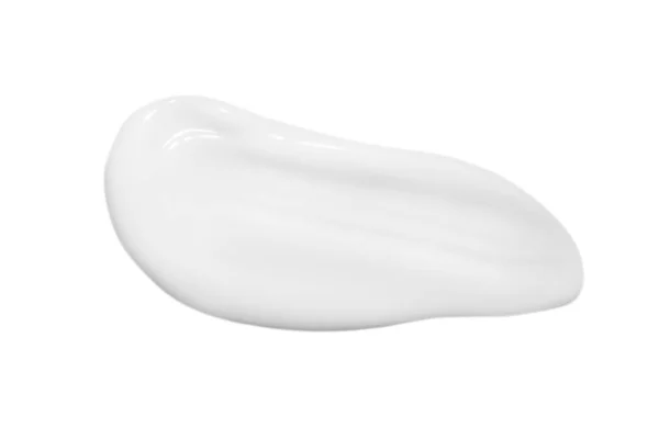Una Goccia Crema Bianca Liquida Spalmata Uno Sfondo Bianco Isolato — Foto Stock