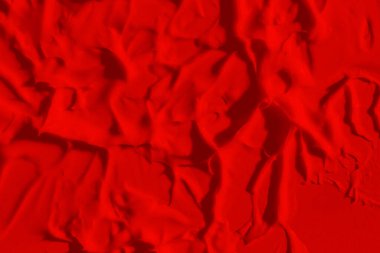 Parlak kırmızı rengin güzel dokusu. Kırmızı renk. Ruj dokusu, göz farı, boya, sıvı kırmızı. leke, leke, leke.