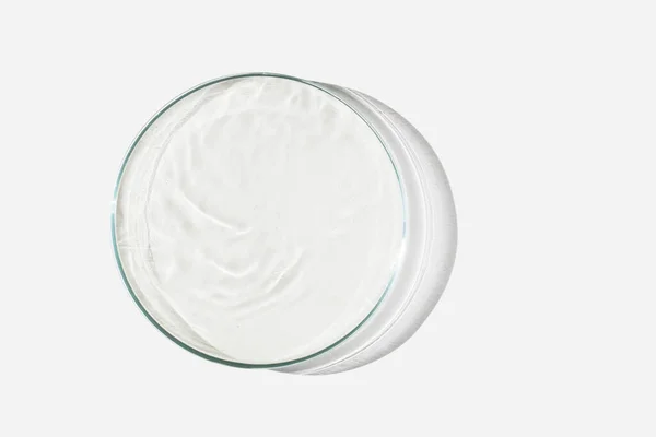 Petri Csészét Könnyű Háttérrel Folyadékkal Vízzel Vízcseppek Hullámok Petri Csészében — Stock Fotó