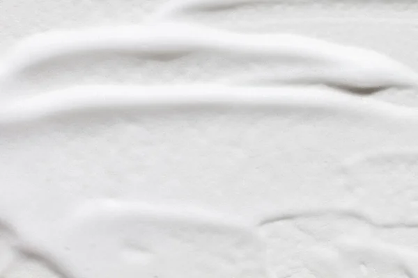 Sebuah Tekstur Dioleskan Busa Putih Seluruh Latar Belakang — Stok Foto