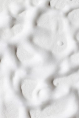  Beyaz köpüğün tüm arka plan üzerindeki dokusu.