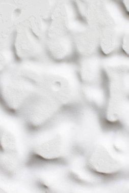  Beyaz köpüğün tüm arka plan üzerindeki dokusu.