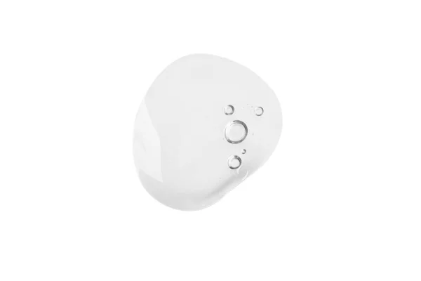 Beyaz arka planda büyük bir damla şeffaf jel. İzole edilmiş