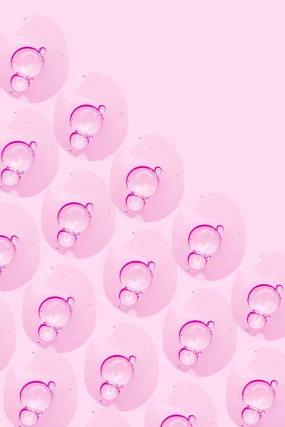 Gotas Redondas Suero Gel Transparente Sobre Fondo Rosa Gel Con — Foto de Stock