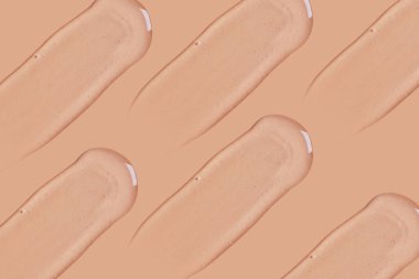 Bej arka planda bir dizi şeffaf jel..