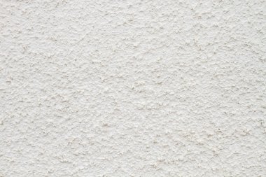 Beyaz alçı dokusu veya küçük girintili bir duvar. 6.