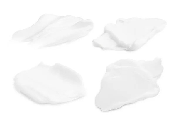 Egy Sor Különböző Stroke Fehér Krém Fehér Alapon — Stock Fotó