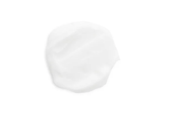 Una Mancha Crema Blanca Sobre Fondo Blanco — Foto de Stock