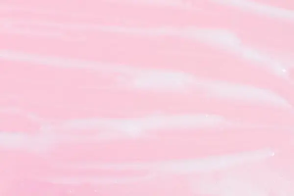 Smeared Greasy Melting Cream Pink Background — Stock Photo, Image