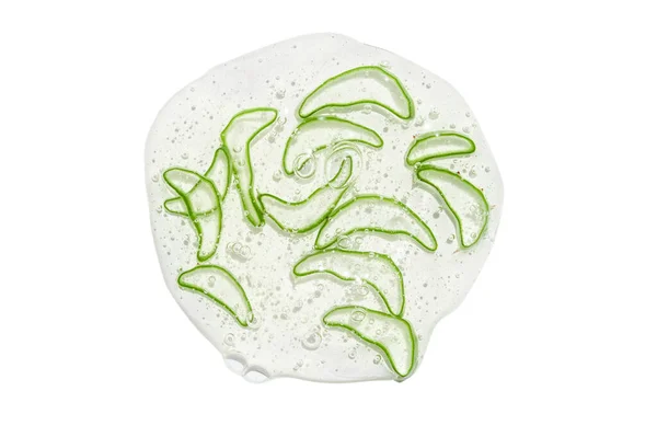 Stock image Thinly sliced slices or pieces of aloe vera in a transparent gel with bubbles. On a white background.