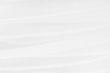 Arka planda kaplanmış beyaz kozmetik krem..