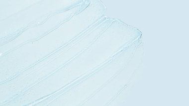 Mavi arka planda şeffaf jel akışı. Reklam için boş yeri olan pankart.