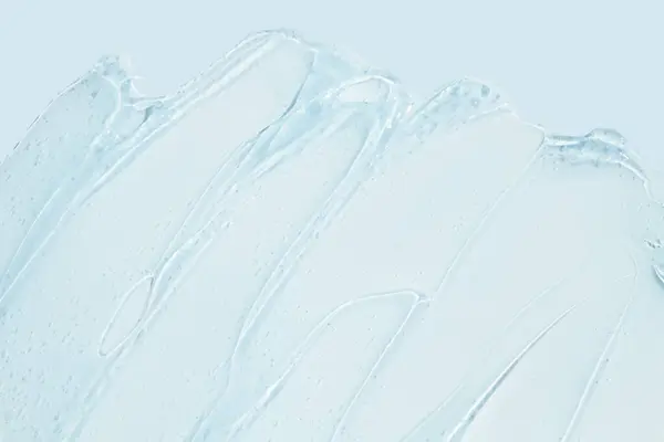 Gel Transparente Fluyendo Sobre Fondo Azul Banner Con Espacio Vacío —  Fotos de Stock