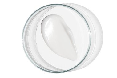 Petri kabı boş arkaplanda izole edildi. Petri kabında kozmetik krem lekesi..