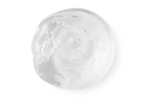 Şeffaf bir jelin büyük bir lekesi ya da damlası, serum. Boş şeffaf bir arkaplanda.