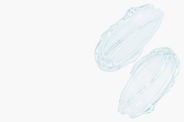 Şeffaf kozmetik jel lekesi. Hafif bir arkaplanda.