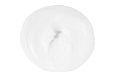Boş bir arkaplanda beyaz krem lekesi.