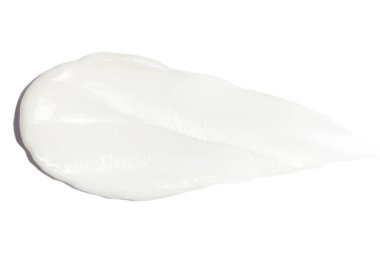 Boş bir arkaplanda bir krem lekesi.