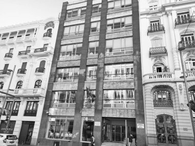 black and white photograph of denunciation of the irrational fusion of building styles in Madrid, Spain