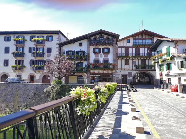 stock image Typical Basque houses along the Bidasoa River in Elizondo, Navarra, Spain,