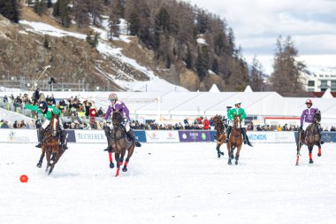 St. Moritz, Switzerland - January 25, 2025 - St. Moritz. 40th Snow Polo World Cup on the frozen lake. clipart