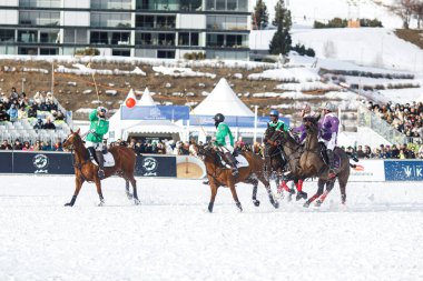 St. Moritz, Switzerland - January 25, 2025 - St. Moritz. 40th Snow Polo World Cup on the frozen lake. clipart