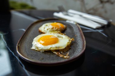 breakfast with fried egg and toast