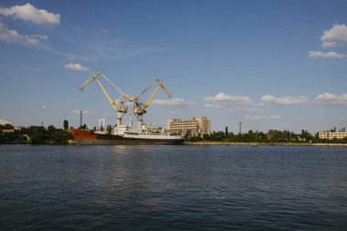 Mykolaiv, Ukraine - . September 4, 2021. Cranes in the port where ships can be repaired. View from the riverside