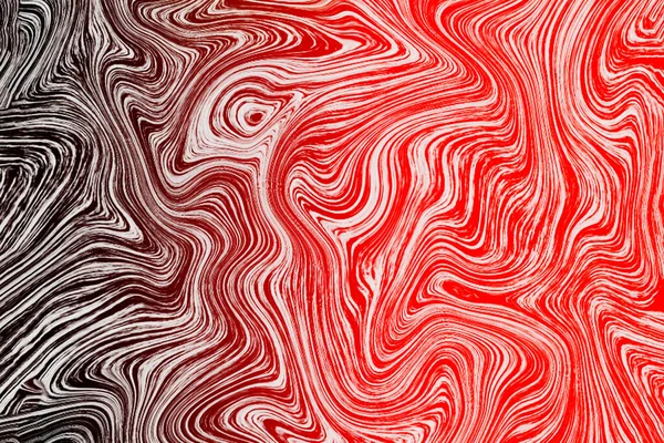 Red pink fluid acrylic hand painted textures. Abstract ART. Swirls of marble or ripples of agate. Very beautiful creative  Modern paint with the addition of powder. Digital watercolor on canvas