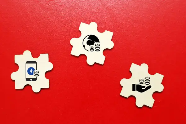 iş konsepti, yapboz parçaları üzerindeki simgeler 