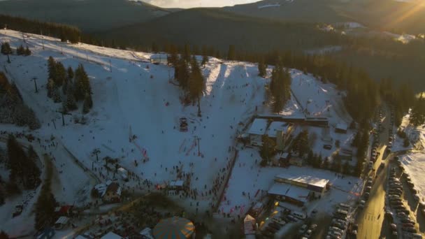 Aerial View Skiing Slope Top Mountain Winter Season Sunset Footage — Stockvideo