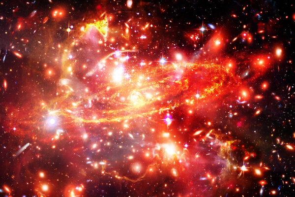 Star cluster and galaxy. The elements of this image furnished by NASA