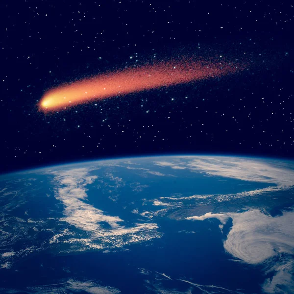 Dünya üzerinde kuyruklu yıldız. Meteor yağmuru. Bu görüntünün elementleri NASA tarafından sağlanmıştır.
