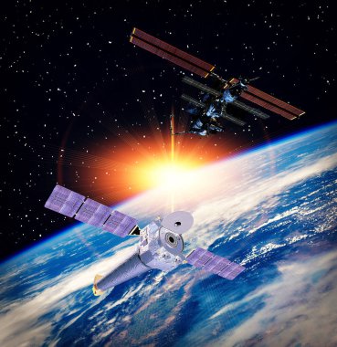 Güzel dünyanın üzerinde uzay gemileri var. Bu görüntünün elementleri NASA tarafından sağlanmıştır.
