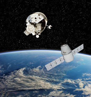 Dünya ve uzay gemileri. Uzay boşluğu. Bu görüntünün elementleri NASA tarafından sağlanmıştır.