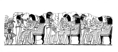 Mısırlı kadınlar, Fillion 'un eski kitabı Atlas de la Bible' de bir şeyler atıştırıyorlar. 1883, Paris.