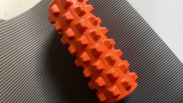 Orange Foam Massage Roller Gym Fitness Equipment Myofascial Release — Stock Video
