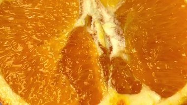 Macro shot of an orange fruit. Close-up of the pulp of an orange.