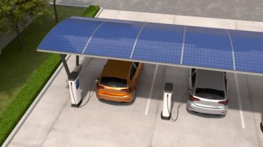 Elektrikli arabalar, güneş paneli enerjisi, EV şarj istasyonu ve temiz enerji doldurma teknolojisiyle dolu araç parkında şarj ediliyor..