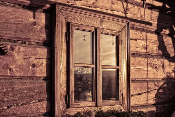 stock image Window of a log house in early morning.Winter season. High quality photo