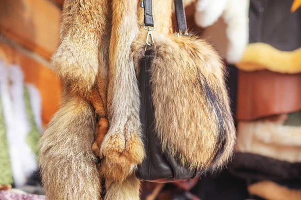 Stock image Fox fur and handbag with real fur displayed in a shop. High quality photo