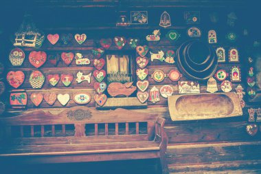 Facade of a log house with colorful decorations. High quality photo