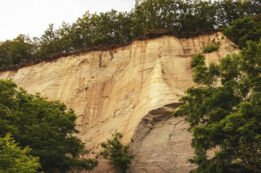 Kumdan duvar, kum kayalığı. Yüksek kalite fotoğraf. Yüksek kalite fotoğraf
