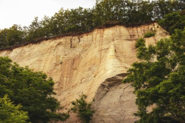 Kumdan duvar, kum kayalığı. Yüksek kalite fotoğraf. Yüksek kalite fotoğraf