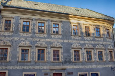 Sgraffito wall decor on the facade of historical building.Banska Stiavnica,Slovakia.High quality photo. High quality photo clipart