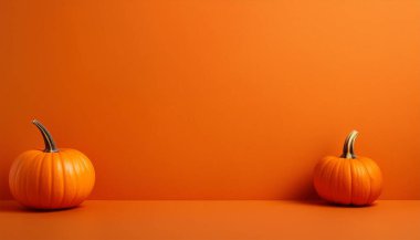 Two Vibrant Pumpkins Symmetrically Positioned Against Bold Orange Background clipart