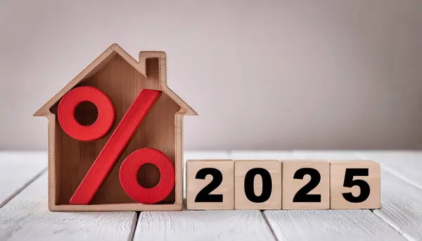 stock image 2025 Real Estate Market and Interest Rates: Wooden House with Percentage Symbol