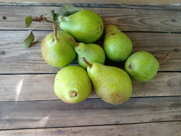 stock image the pear fell asleep on the board