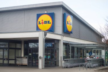 Neuenburg - Germany - 19 February 2023 - Closeup of lidl logo on supermarket store front 